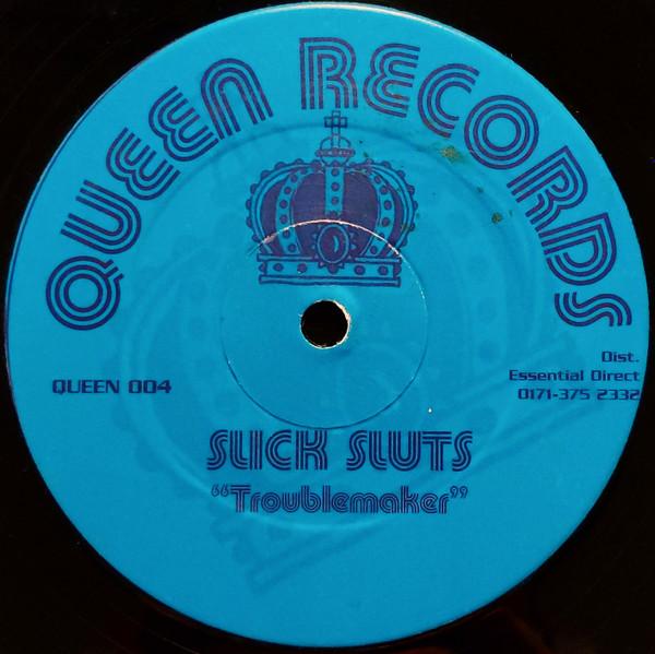 Slick Sluts - Troublemaker
